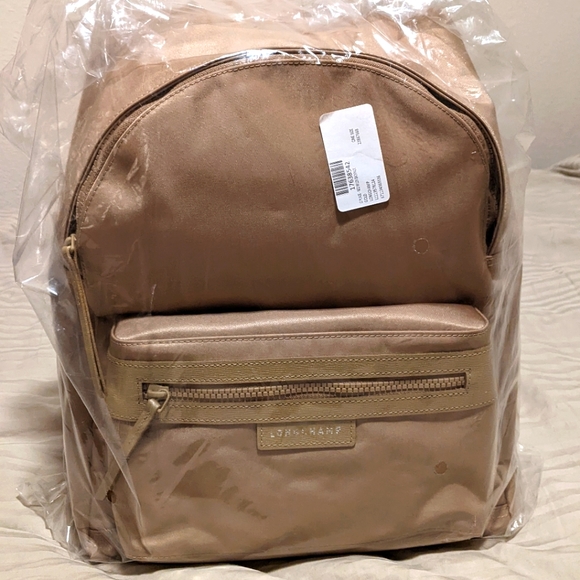 Longchamp Handbags - NWT. Gold Longchamp Le Pliage Neo Nylon Backpack